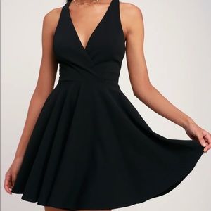 LuLus Wonder Whirl Black Twist Back Skater Dress